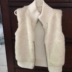 Cream vest with fur.  NWOT  The front has fur and the back is a sweater.